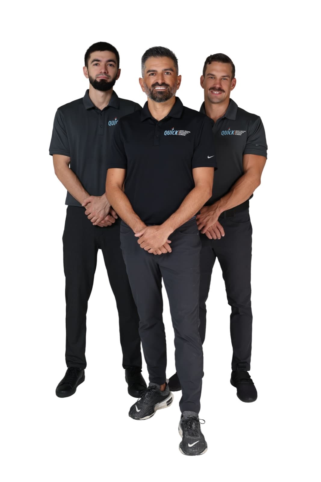 Three of the Quick Water Heater crew in company polos, arms crossed
